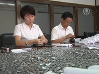 Китаянка положила в банк 100 тысяч монет