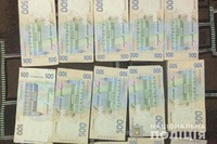 Поліцейські встановили осіб, причетних до крадіжки грошей з помешкання підприємця з Борщівщини