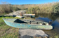 Поліцейські Полтавщини викрили двох браконьєрів на воді: у правопорушників виявили човен, сітки та рибу