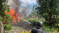 Харківщина: рятувальники ліквідували пожежу після російського бомбардування м. Дергачі